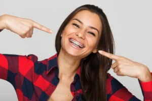 Face,Of,A,Young,Woman,With,Braces,On,Her,Teeth